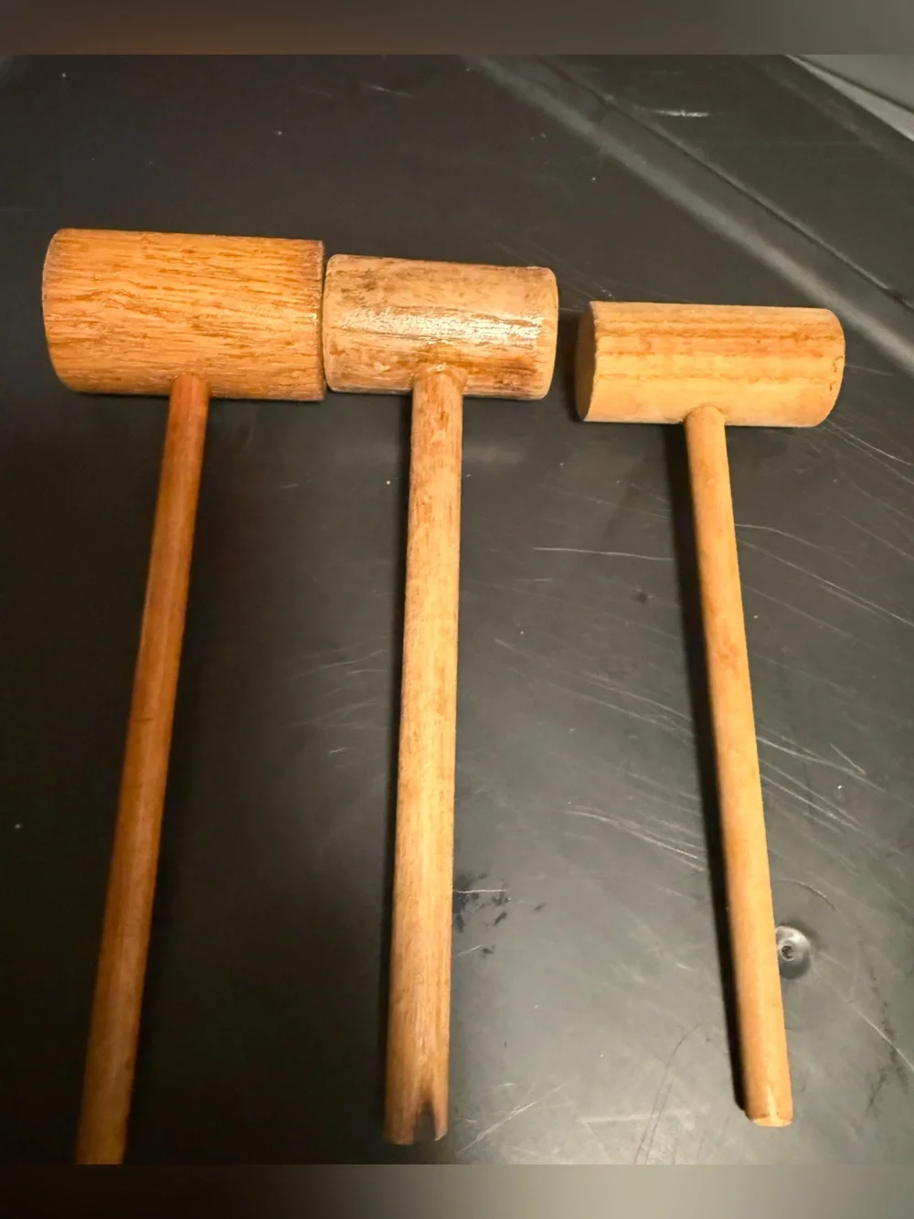 traditional wooden mallets, commonly used for tasks like cracking shellfish,
